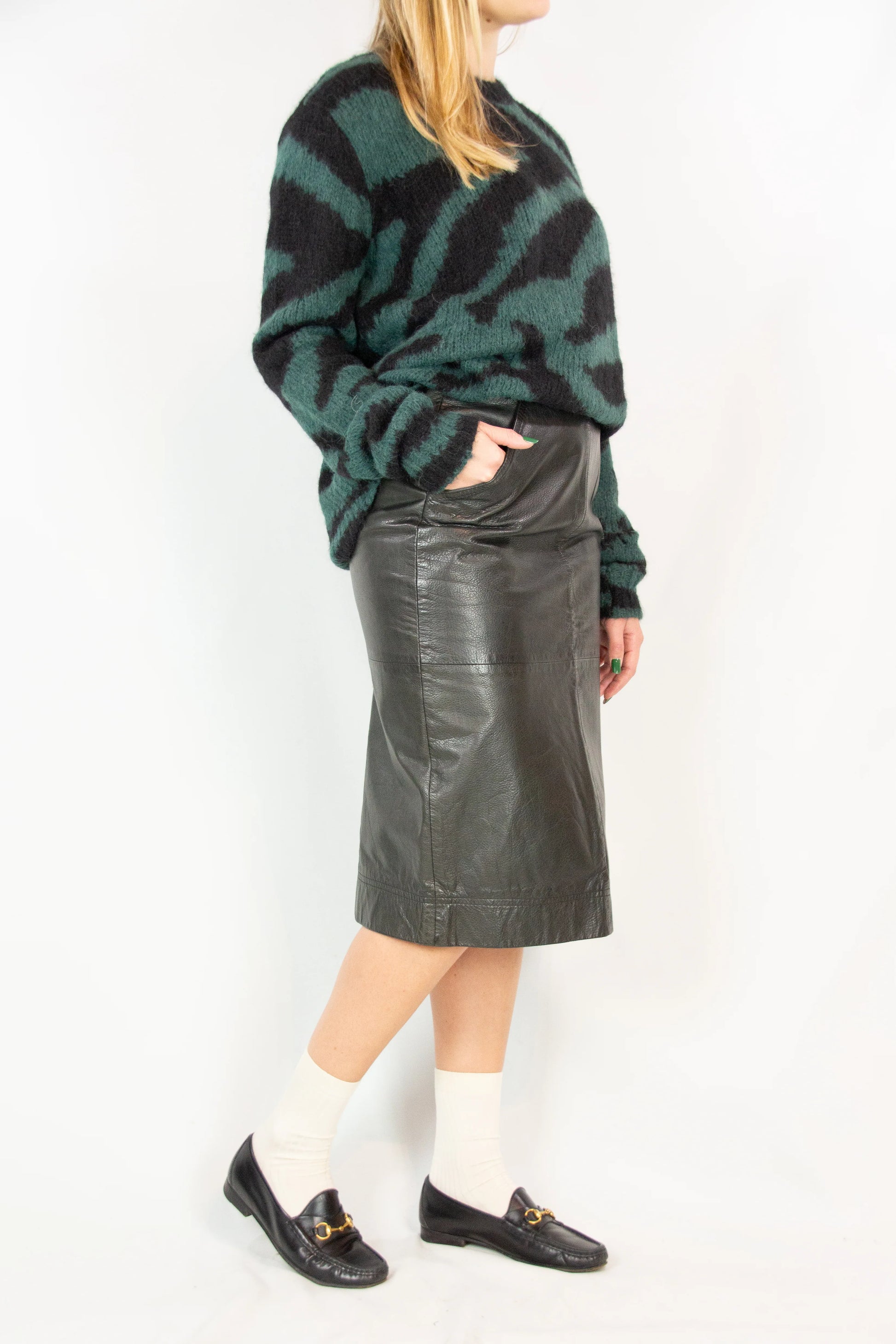 Black leather pencil skirt with back slit