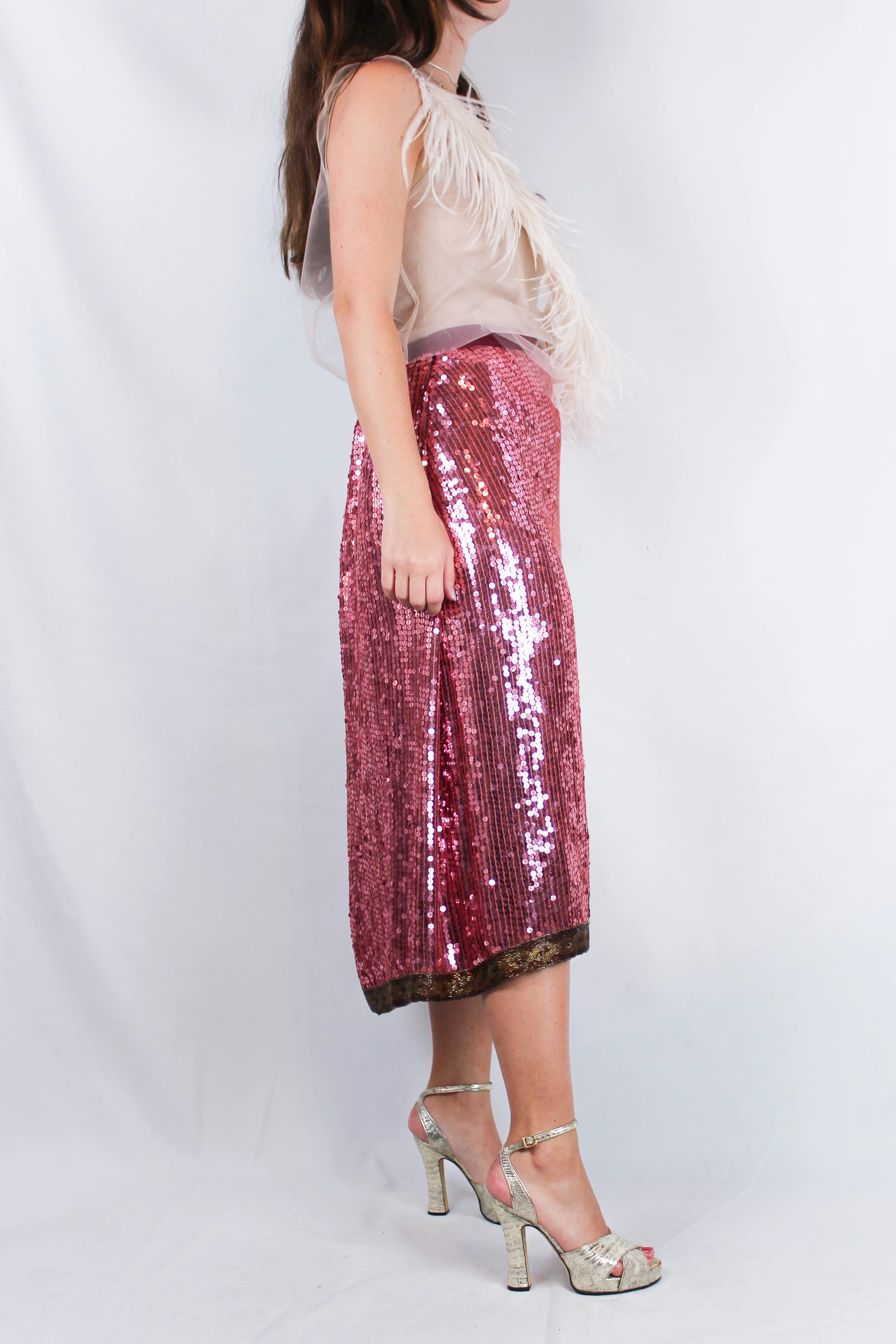 Pink sequin midi skirt with geometric beaded hem