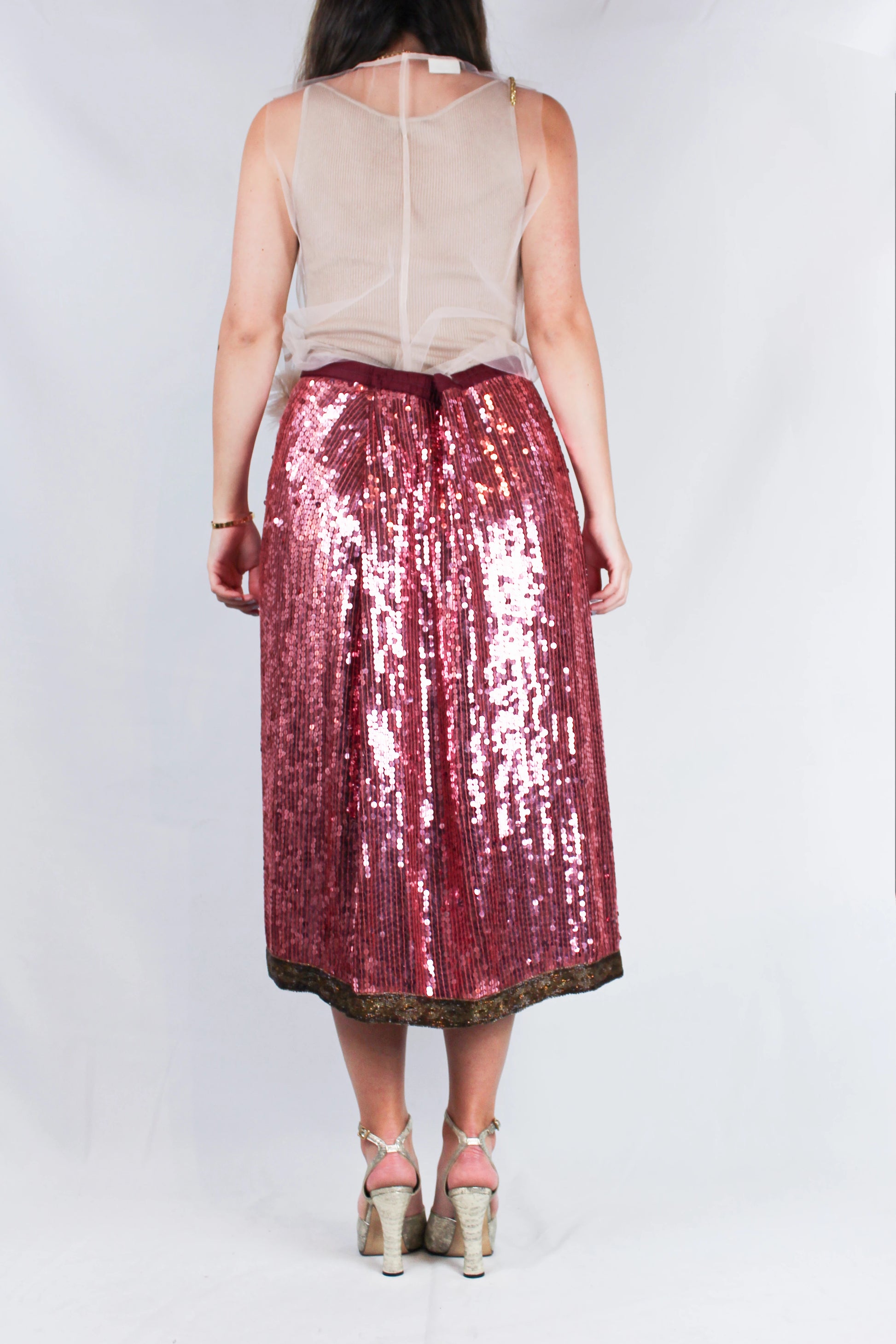 Pink sequin midi skirt with geometric beaded hem