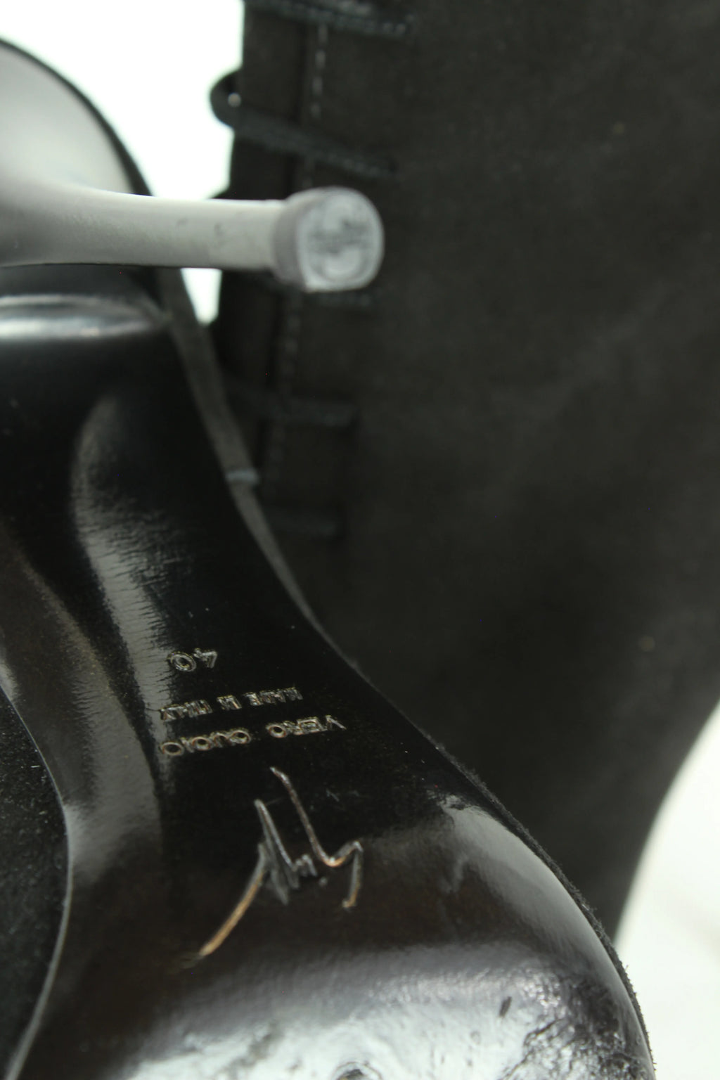 Black jeweled buttons boots