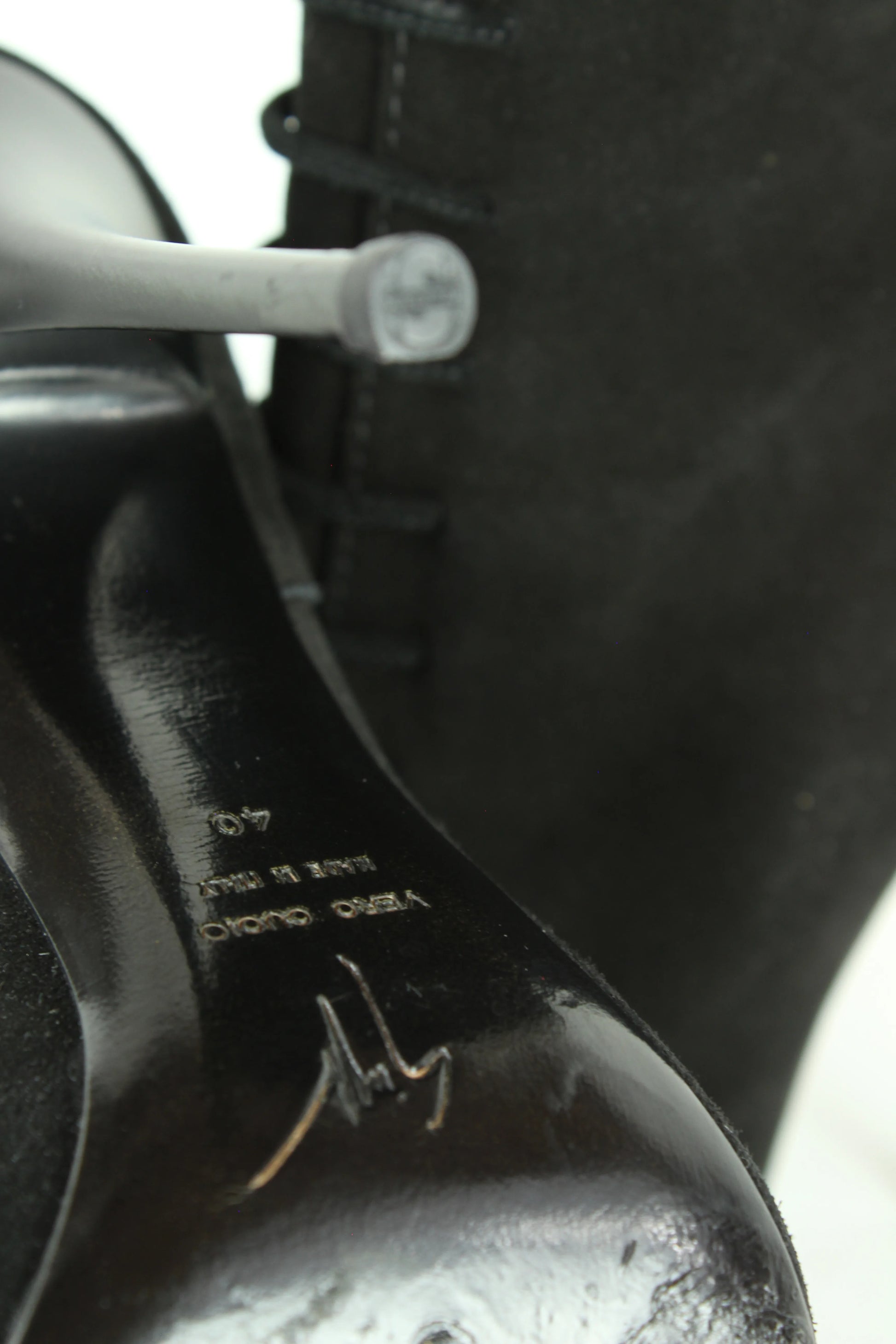 Black jeweled buttons boots