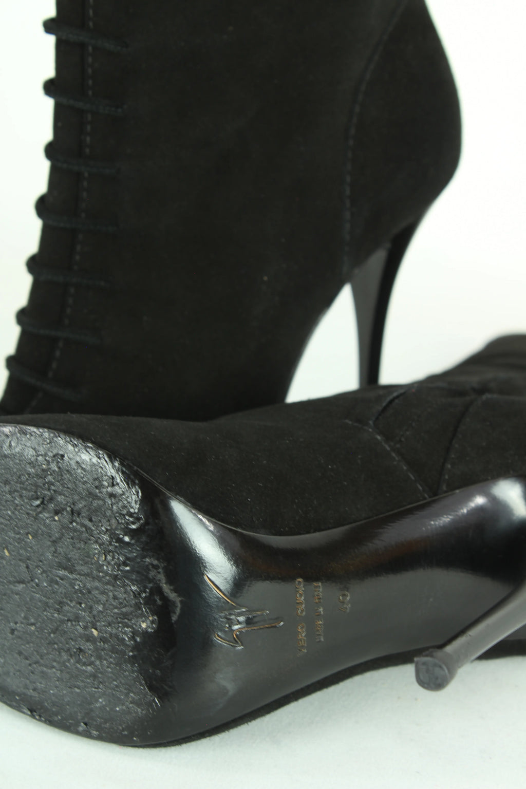 Black jeweled buttons boots